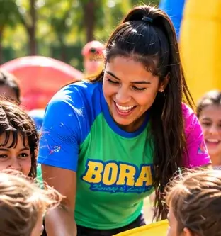 Recreadora e crianças participando de uma brincadeira